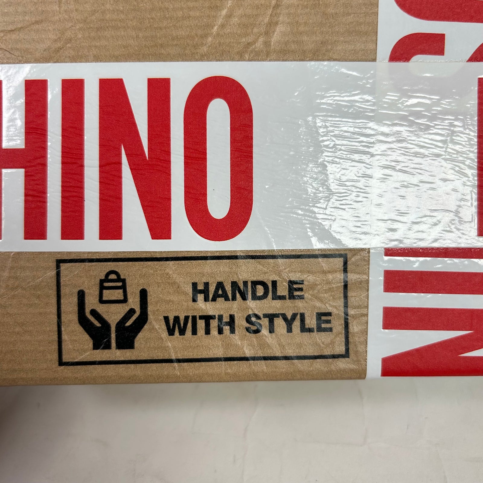 Moschino SS26 Shipping Box Clutch Bag