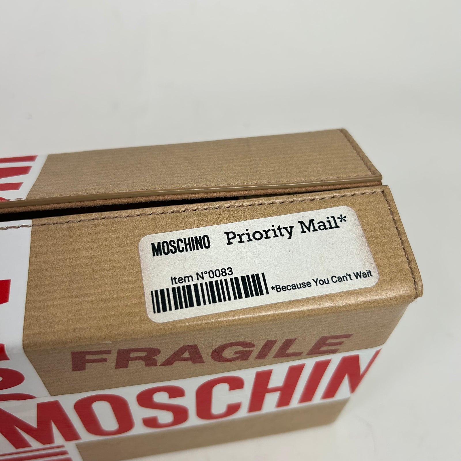 Moschino SS26 Shipping Box Clutch Bag