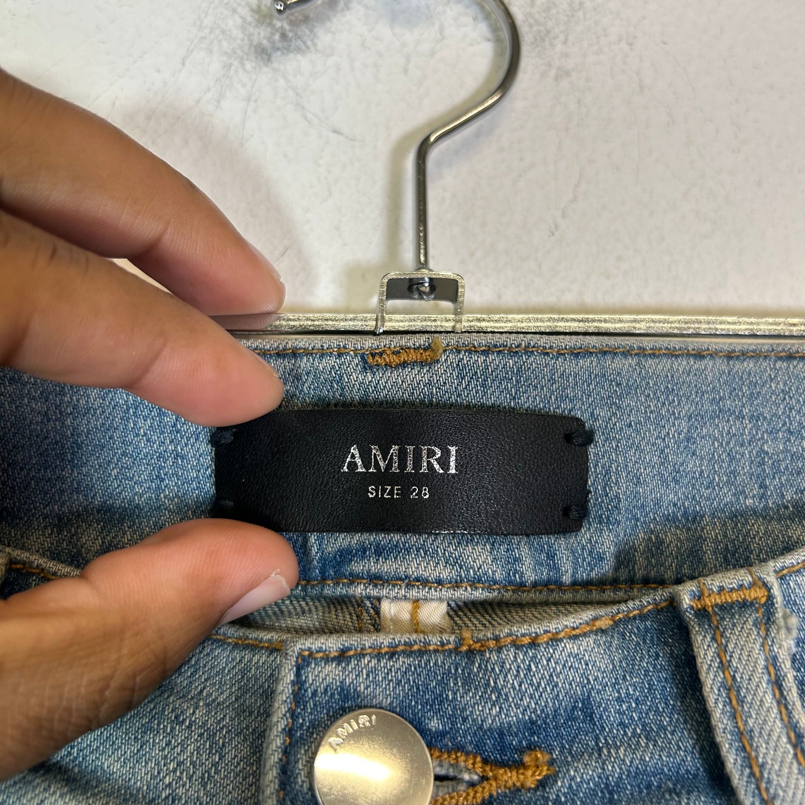 Amiri Lightwash Staggered Logo Denim Jeans