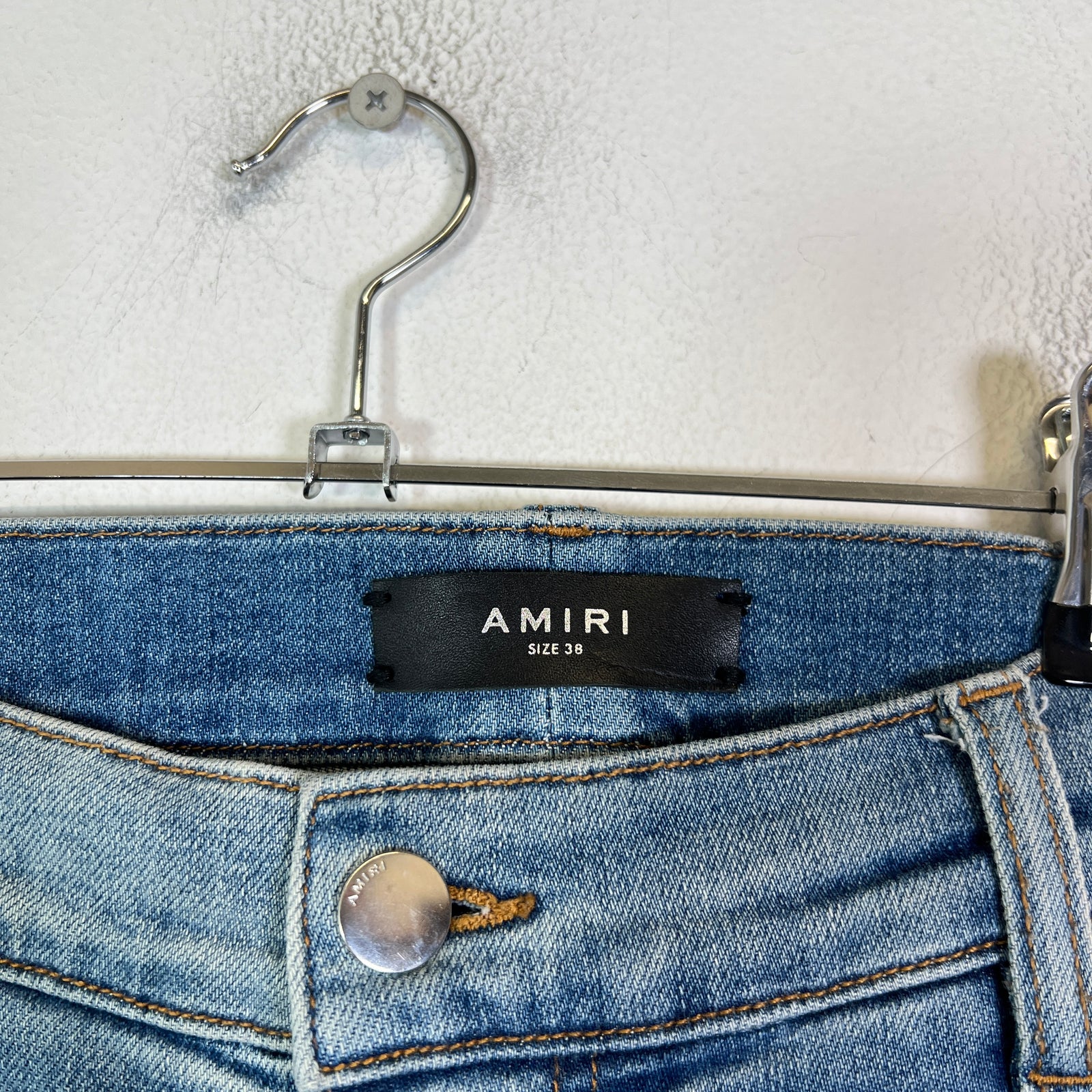 Amiri Lightwash Denim Patch Distressed Jeans