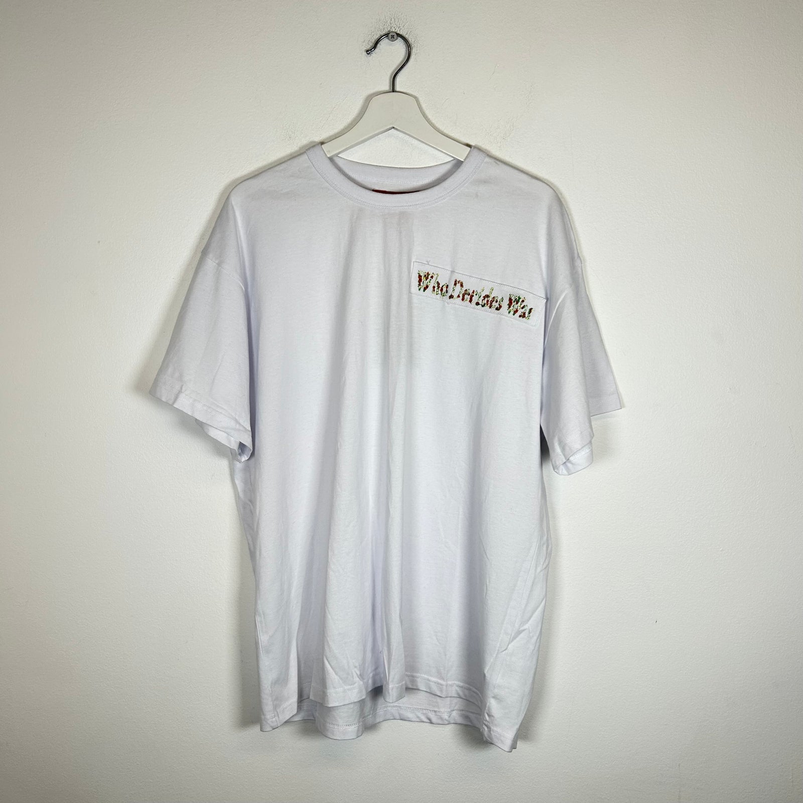 Who Decides War White Nameplate Embroidered Tee Size L