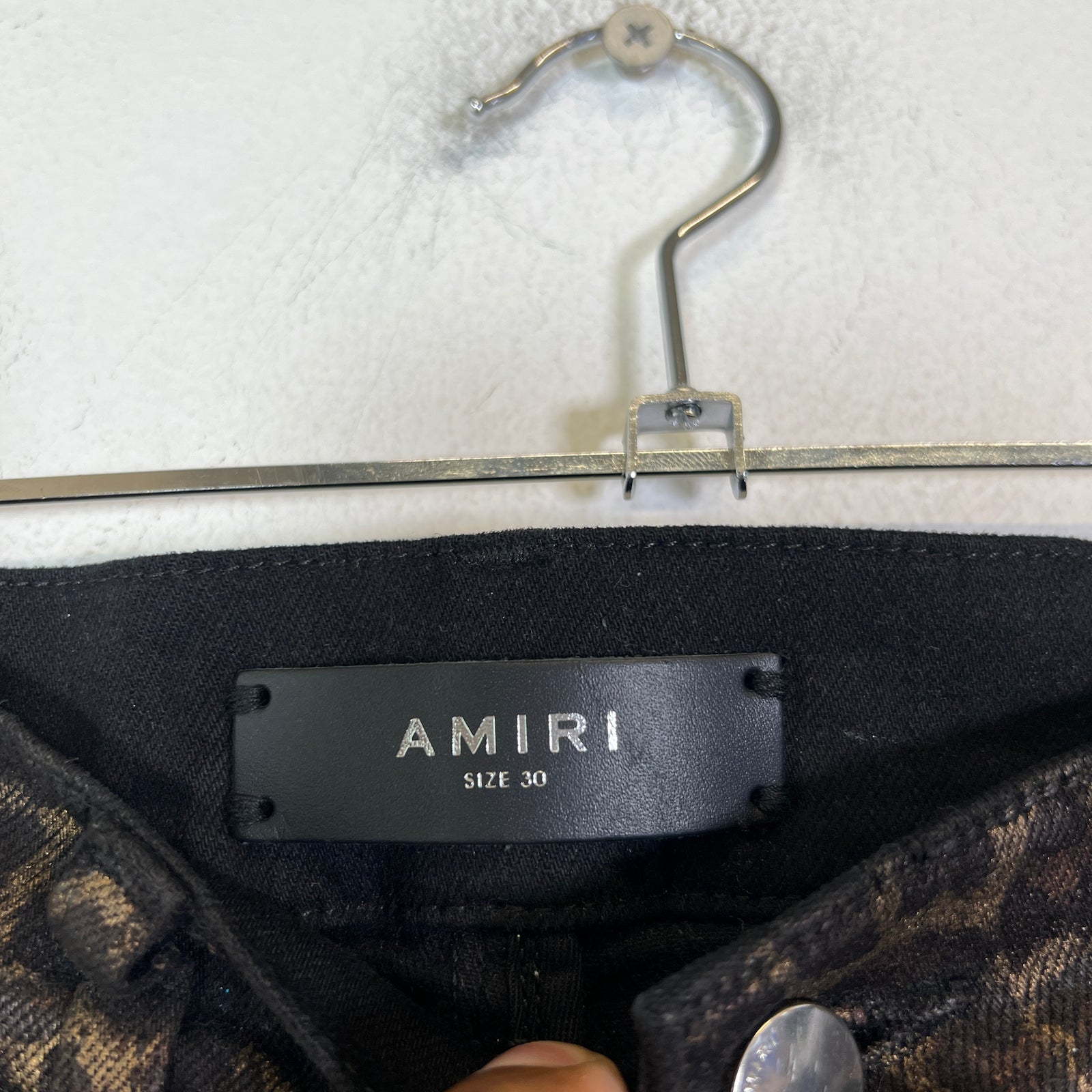 Amiri Broken Leopard Waxed Distressed Jeans