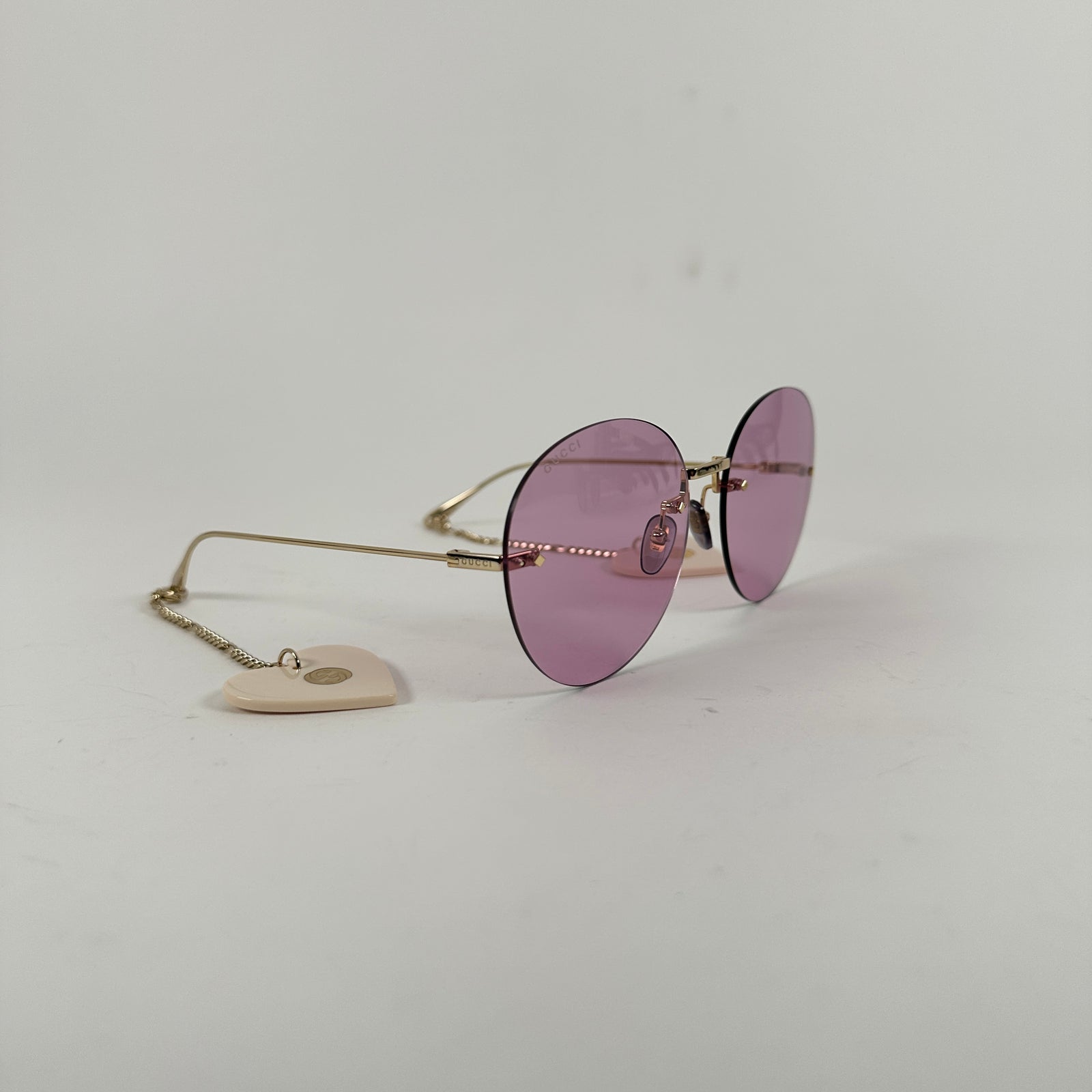 Gucci Purple Circular Rimless Sunglasses