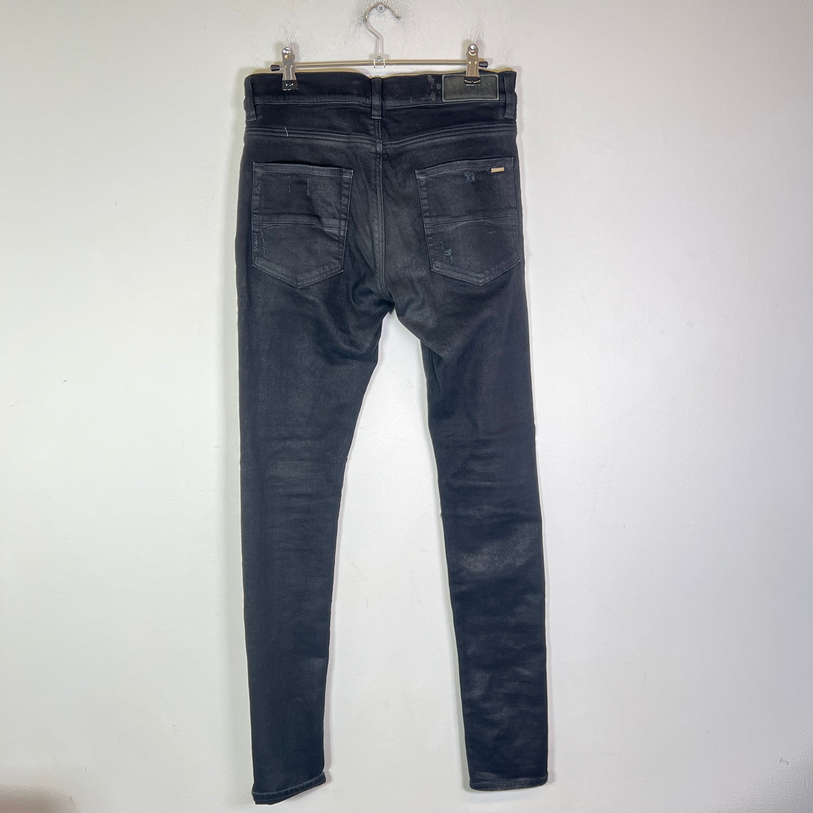 Amiri MX1 Black Waxed Denim Jeans