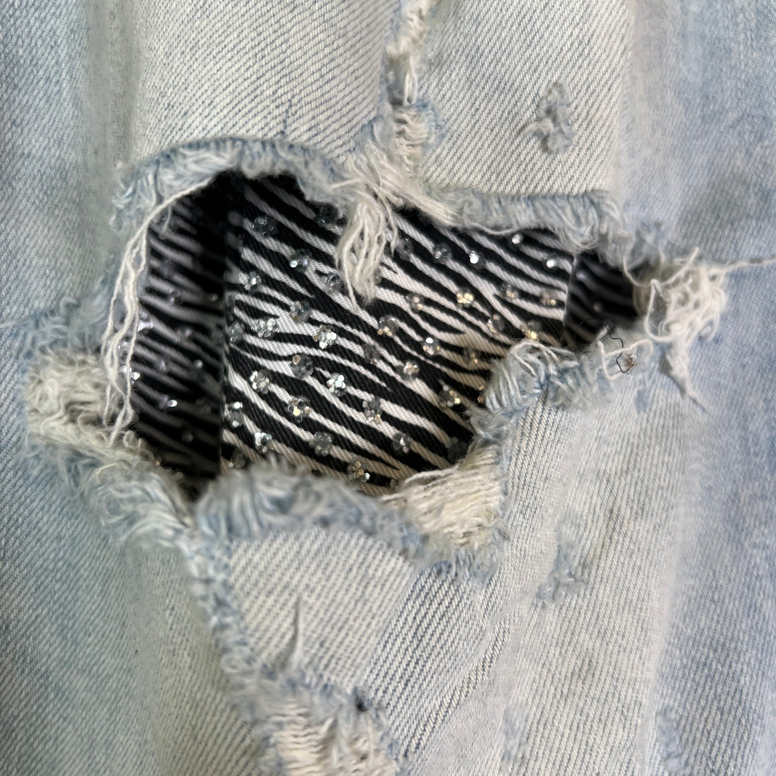 Amiri Lightwash Zebra Patch Distressed Jeans