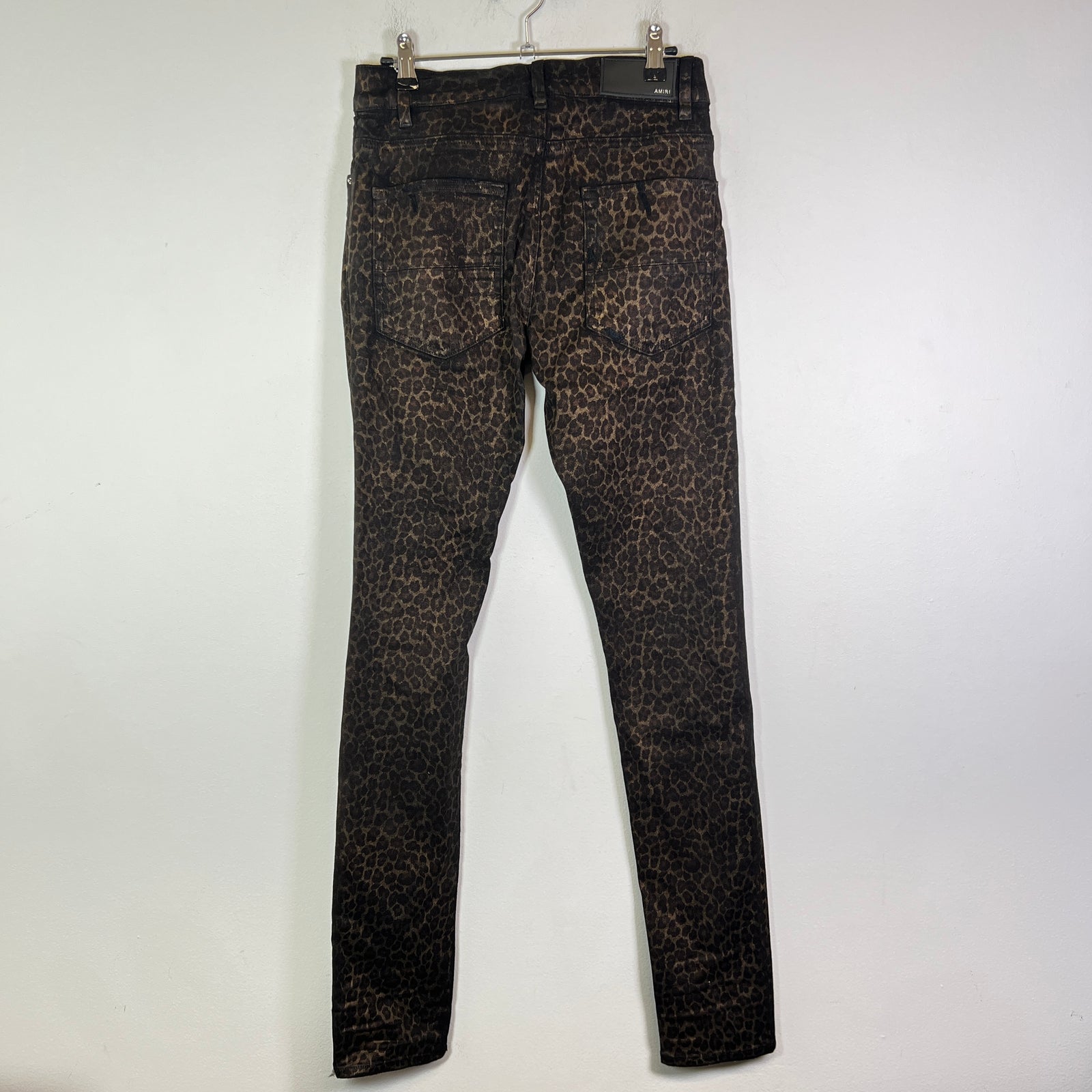 Amiri Broken Leopard Waxed Distressed Jeans