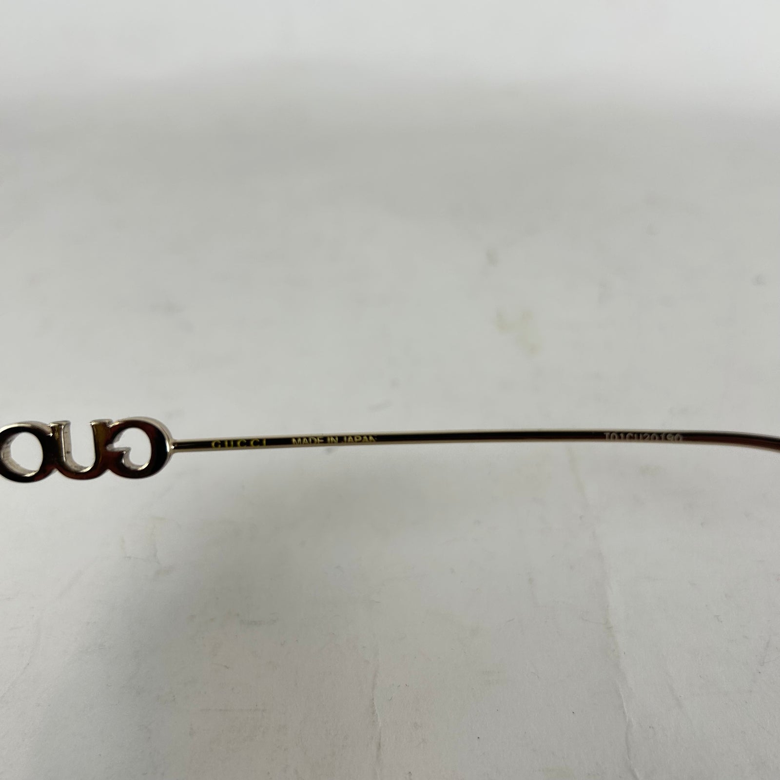 Gucci Spellout Logo Rimless Sunglasses
