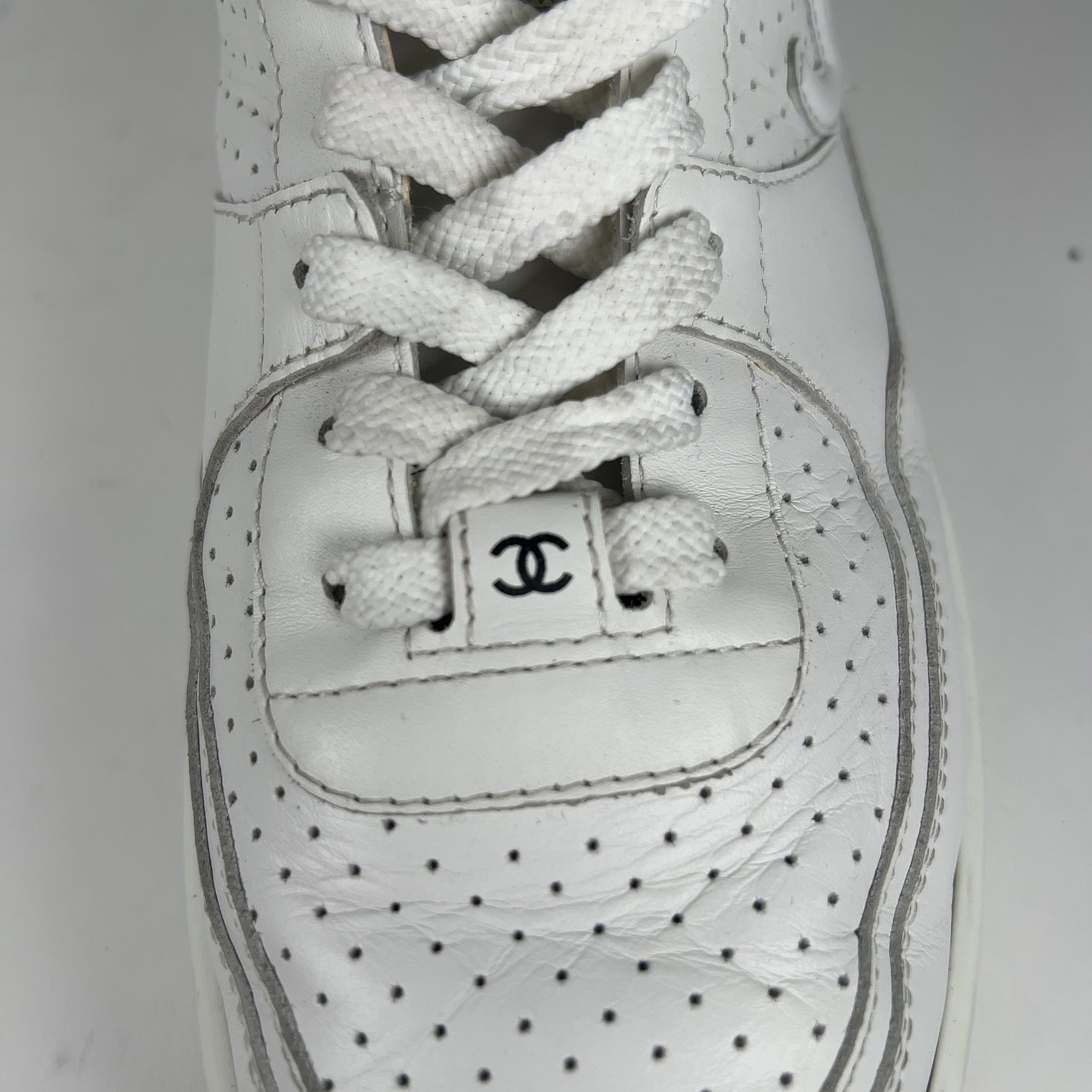 Chanel CC Triple White Hightop Sneakers