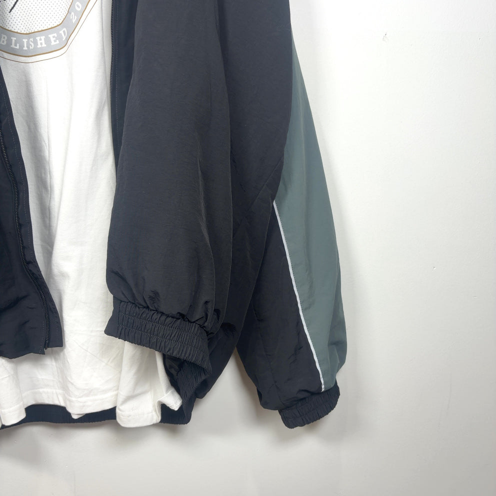 Martine Rose Paneled Nylon Track Light Jacket