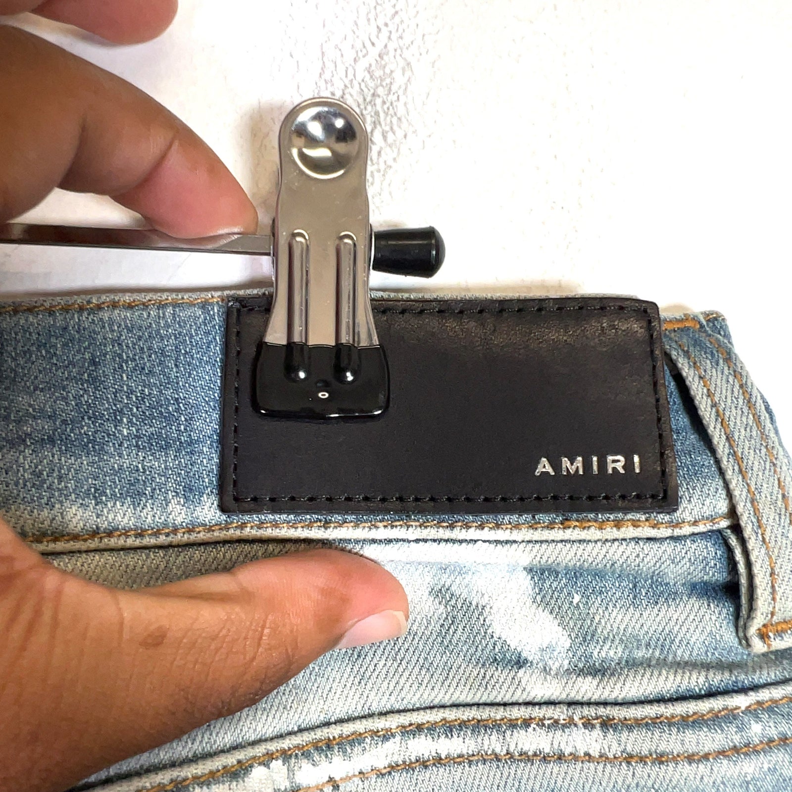 Amiri Distressed Paint Splatter Denim Jeans