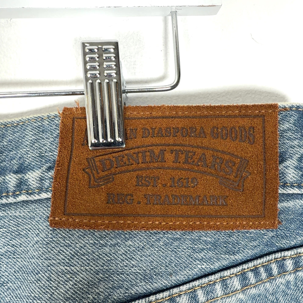 Denim Tears Wreath Graphic Denim Jeans