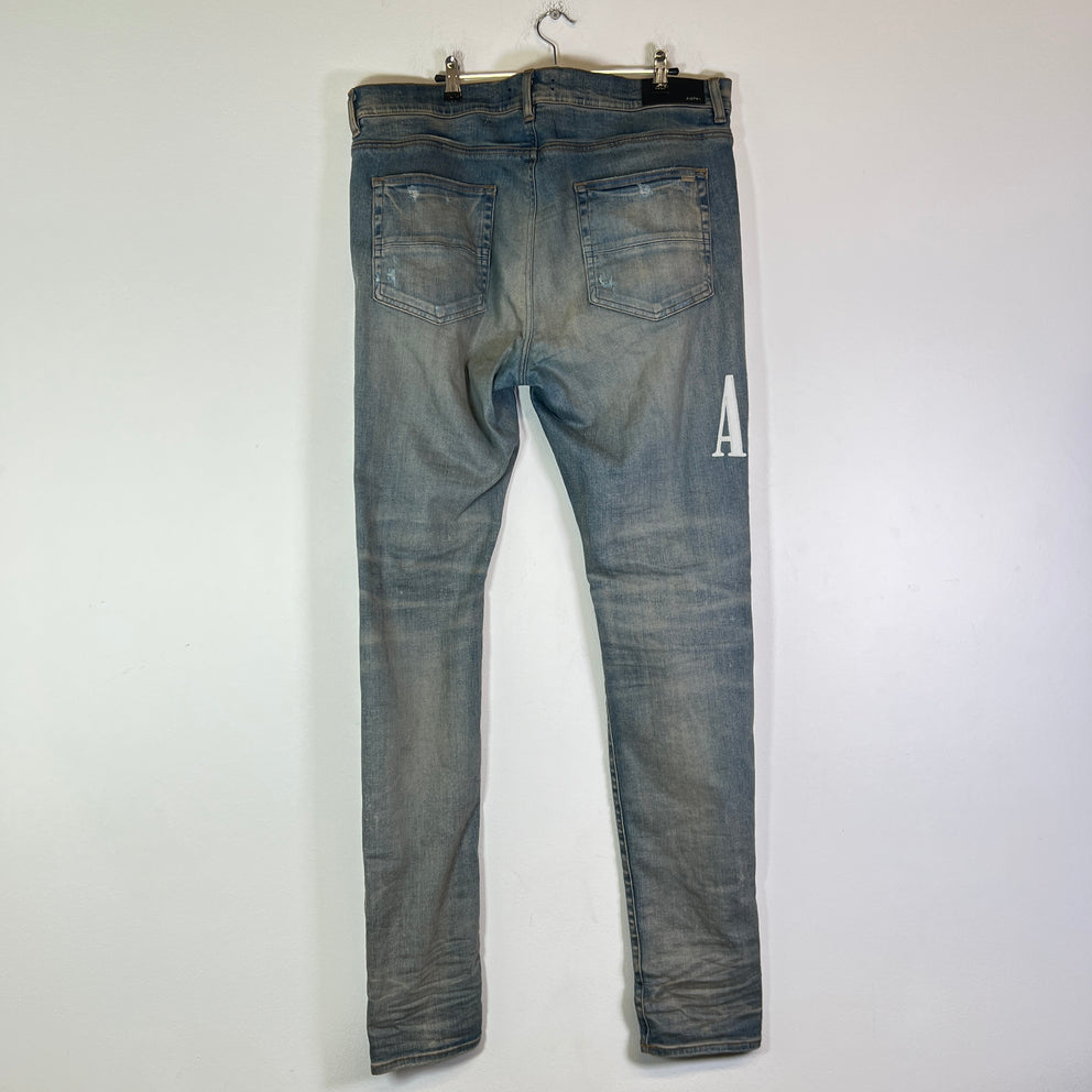 Amiri Clay Indigo Core Applique Logo Jeans