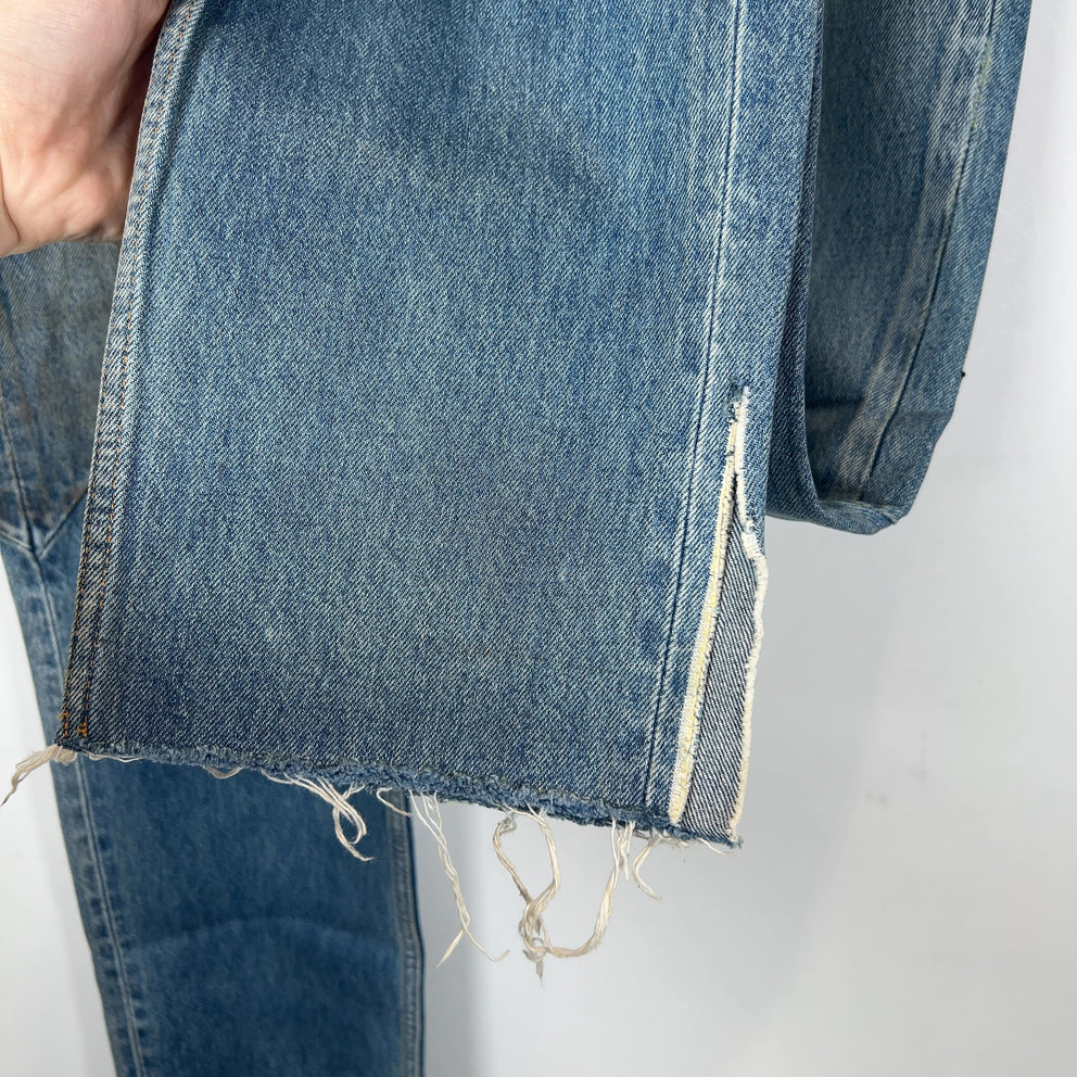 Balenciaga Waxed Distressed Denim Jeans