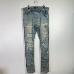 Amiri Light Indigo Floral Studded Denim Jeans