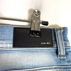 Amiri Light Indigo Hibiscus Art Patch Denim Jeans