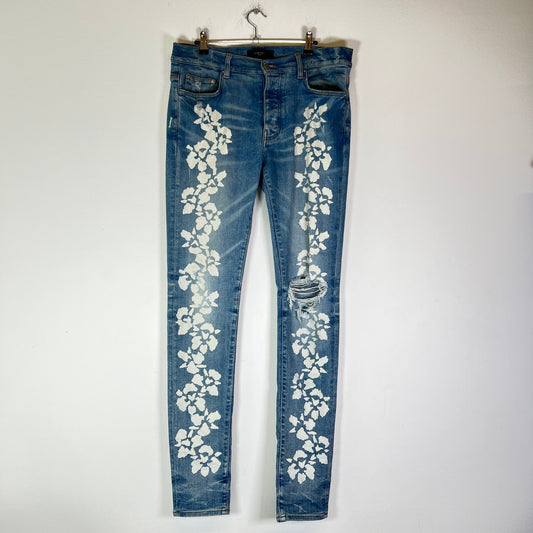 Amiri Lightwash Hibiscus Stencil Jeans