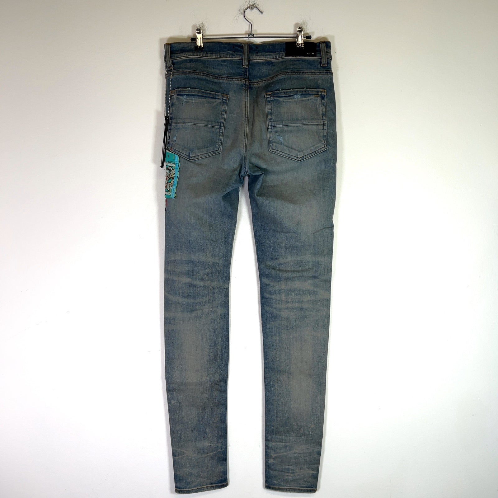 Amiri Clay Indigo Quilted Art Patch Denim Jeans
