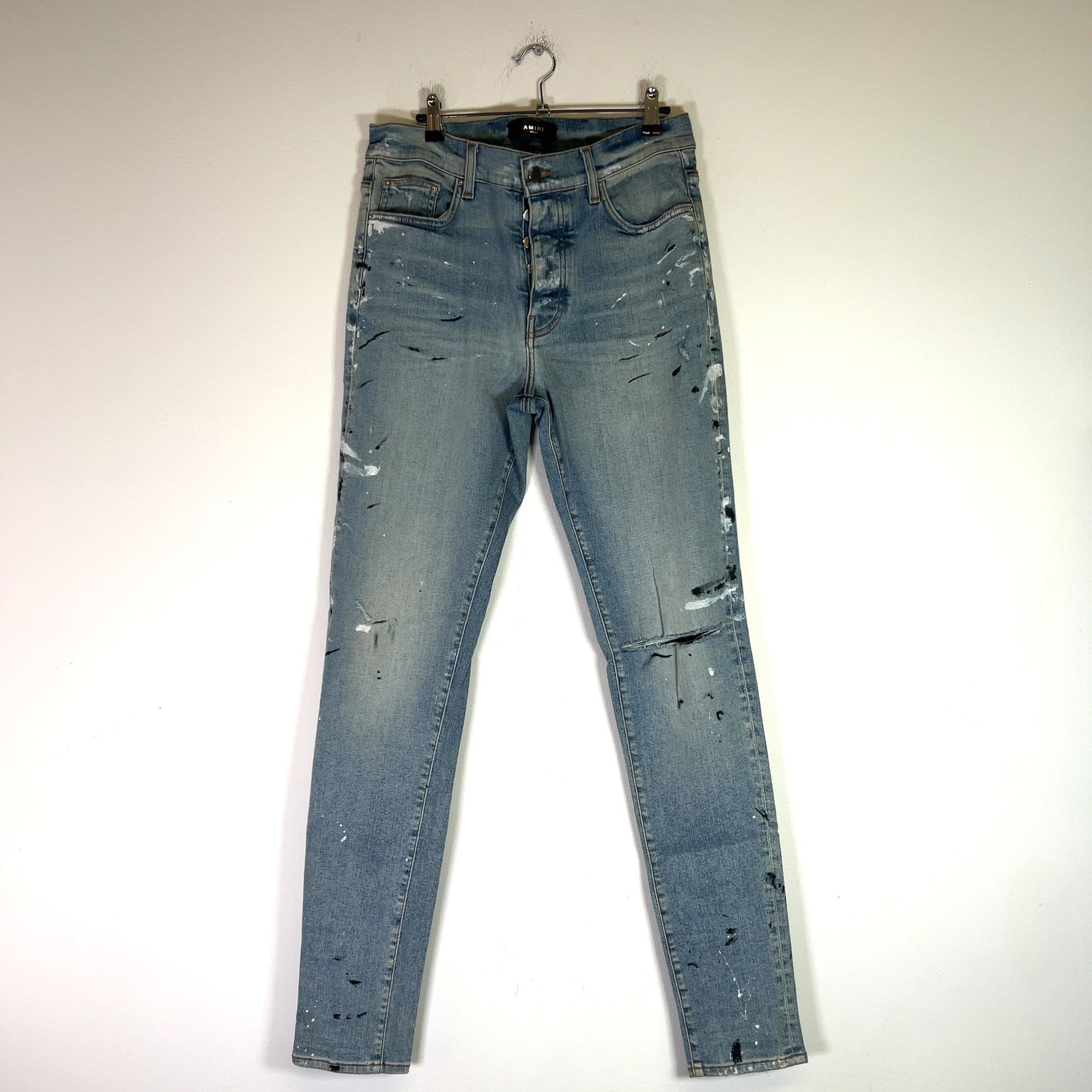 Amiri Distressed Paint Splatter Denim Jeans
