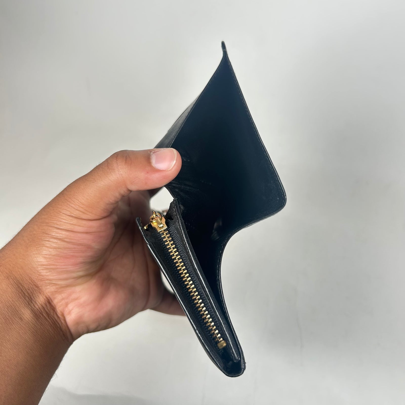 Yves Saint Laurent Black Embossed YSL Wallet