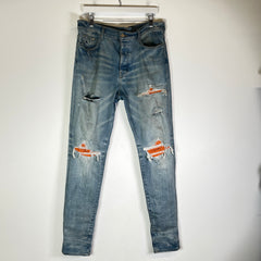 Amiri Cracked Orange Distressed MX1 Jeans