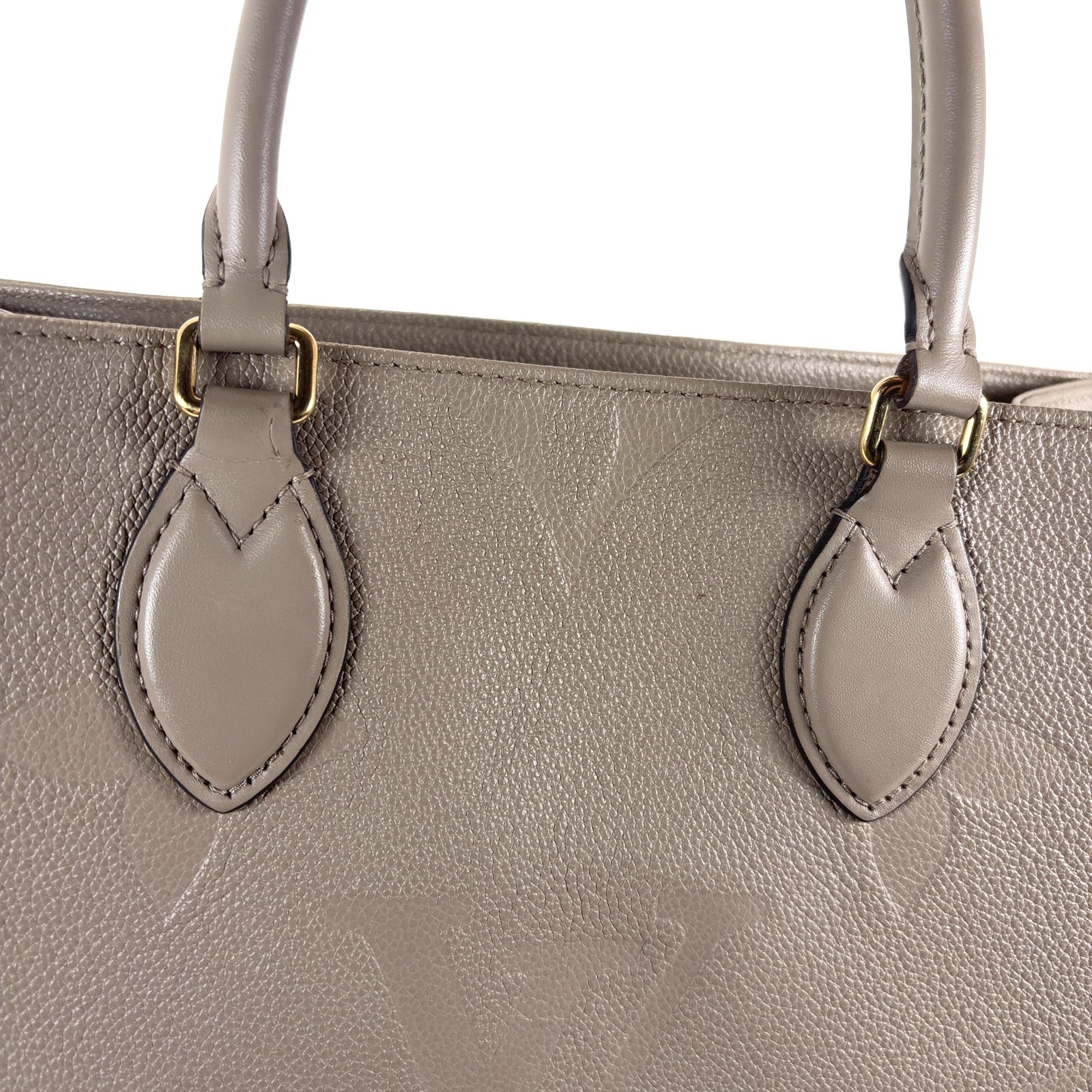 Louis Vuitton Empreinte All Over Monogram Tote Bag