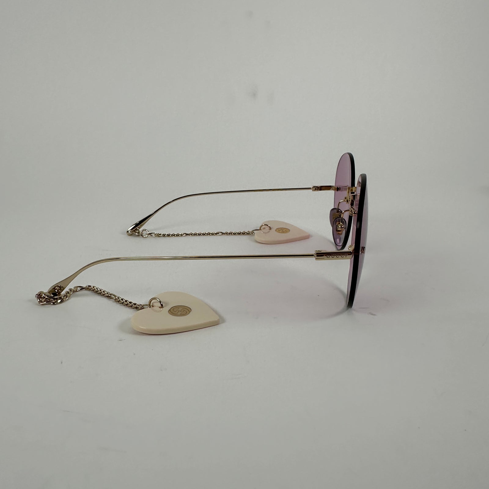 Gucci Purple Circular Rimless Sunglasses