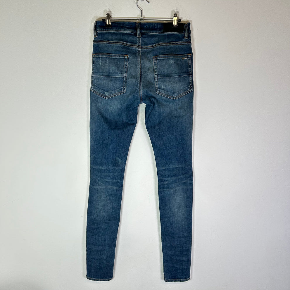 Amiri MX1 Indigo Black Patch Jeans