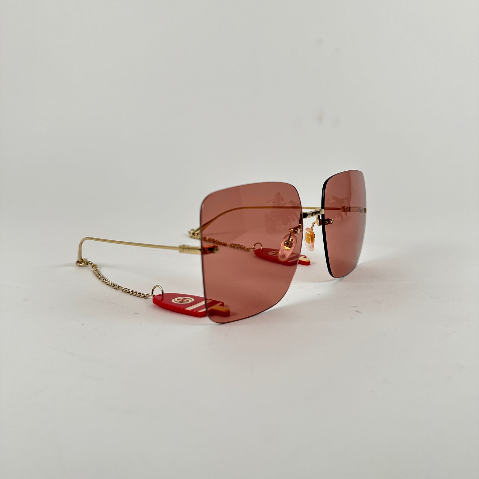 Gucci Pink Square Rimless Sunglasses