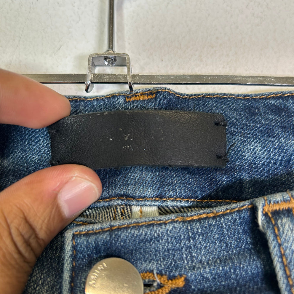 Amiri MX1 Indigo Black Patch Jeans