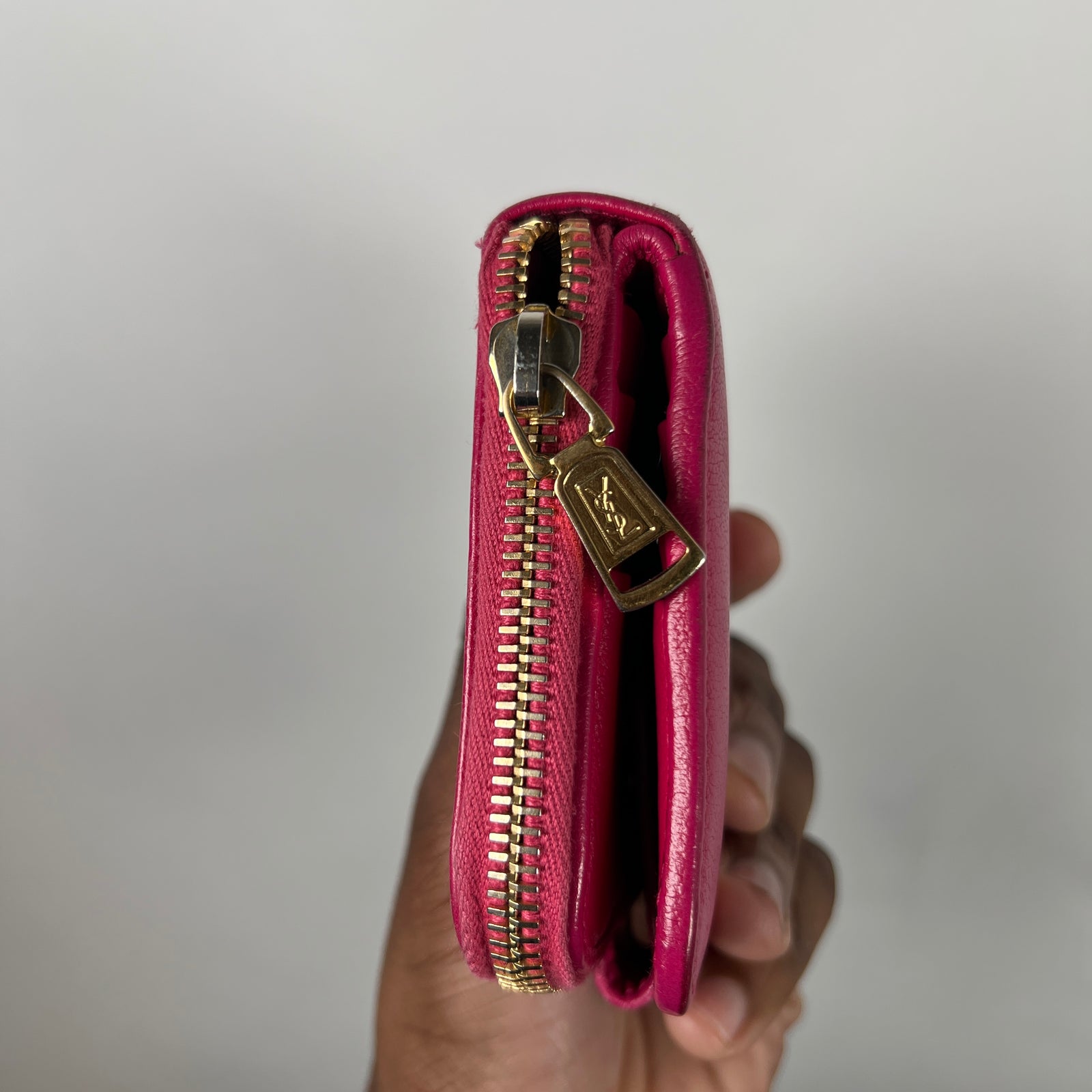 Yves Saint Laurent Pink Cassandra Embossed Round Zip Wallet
