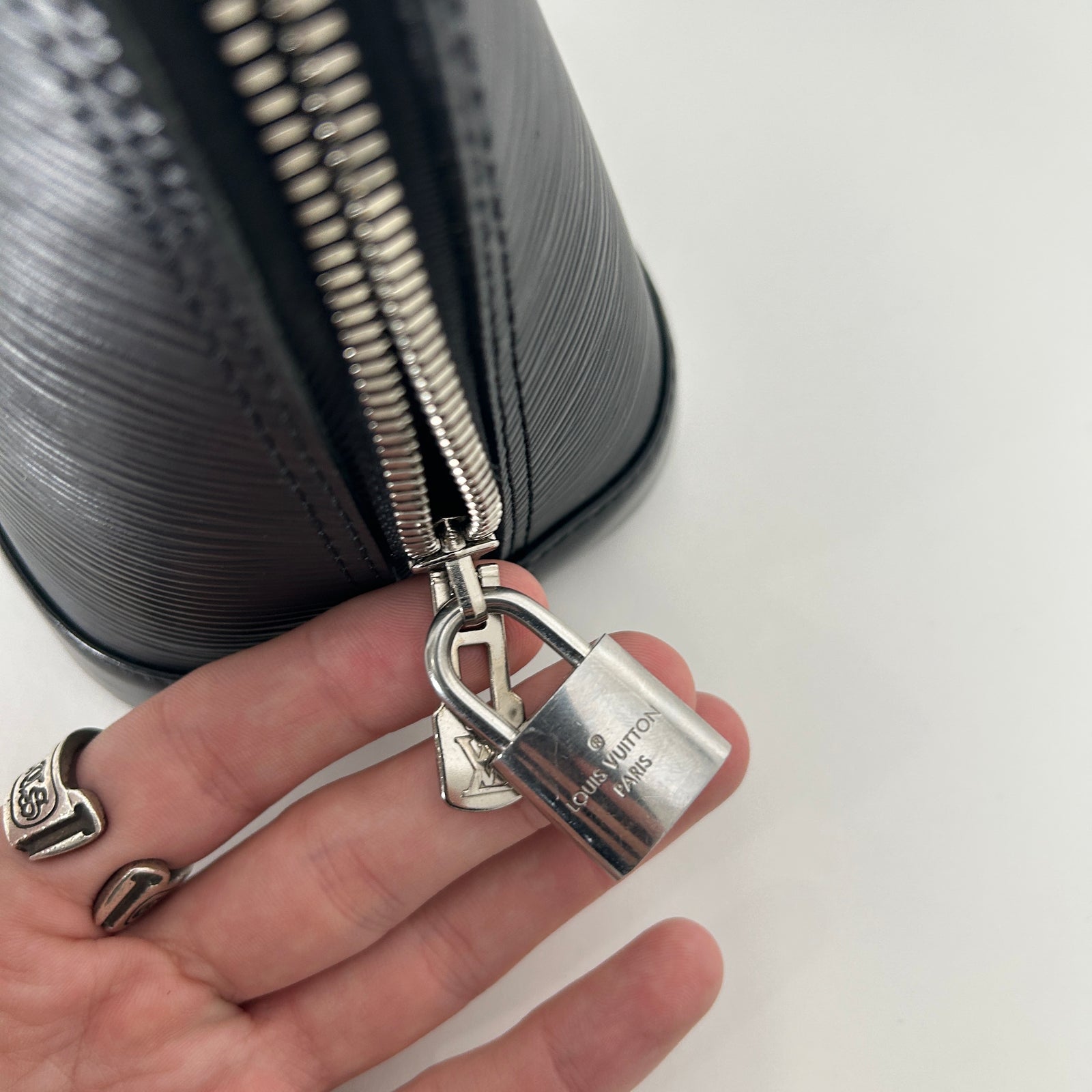 Louis Vuitton Alma Black Epi Leather Purse