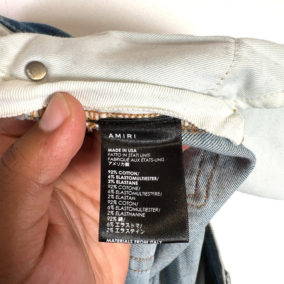 Amiri Distressed Paint Splatter Denim Jeans