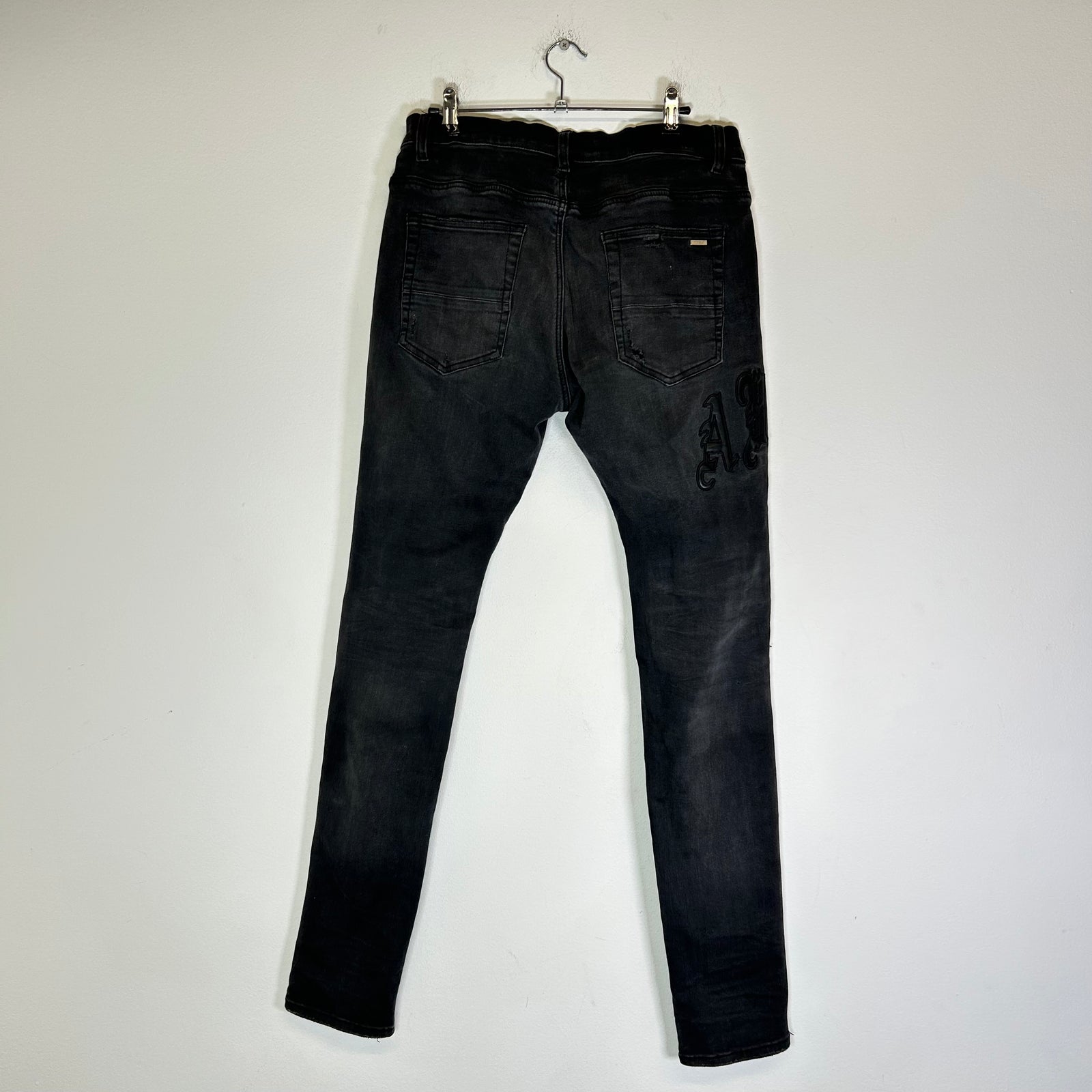 Amiri MX1 Old English Jeans