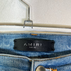 Amiri Lightwash Hibiscus Stencil Jeans