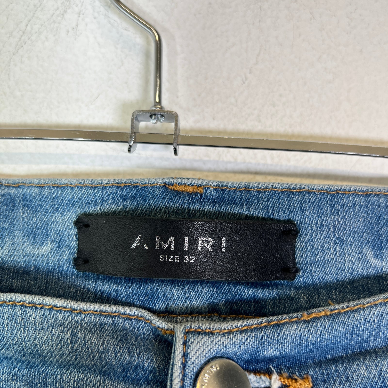 Amiri Lightwash Hibiscus Stencil Jeans