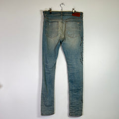 Amiri Light Indigo Floral Studded Denim Jeans