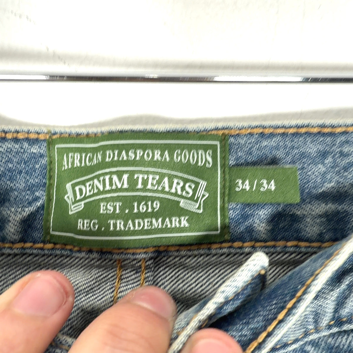 Denim Tears Wreath Graphic Denim Jeans