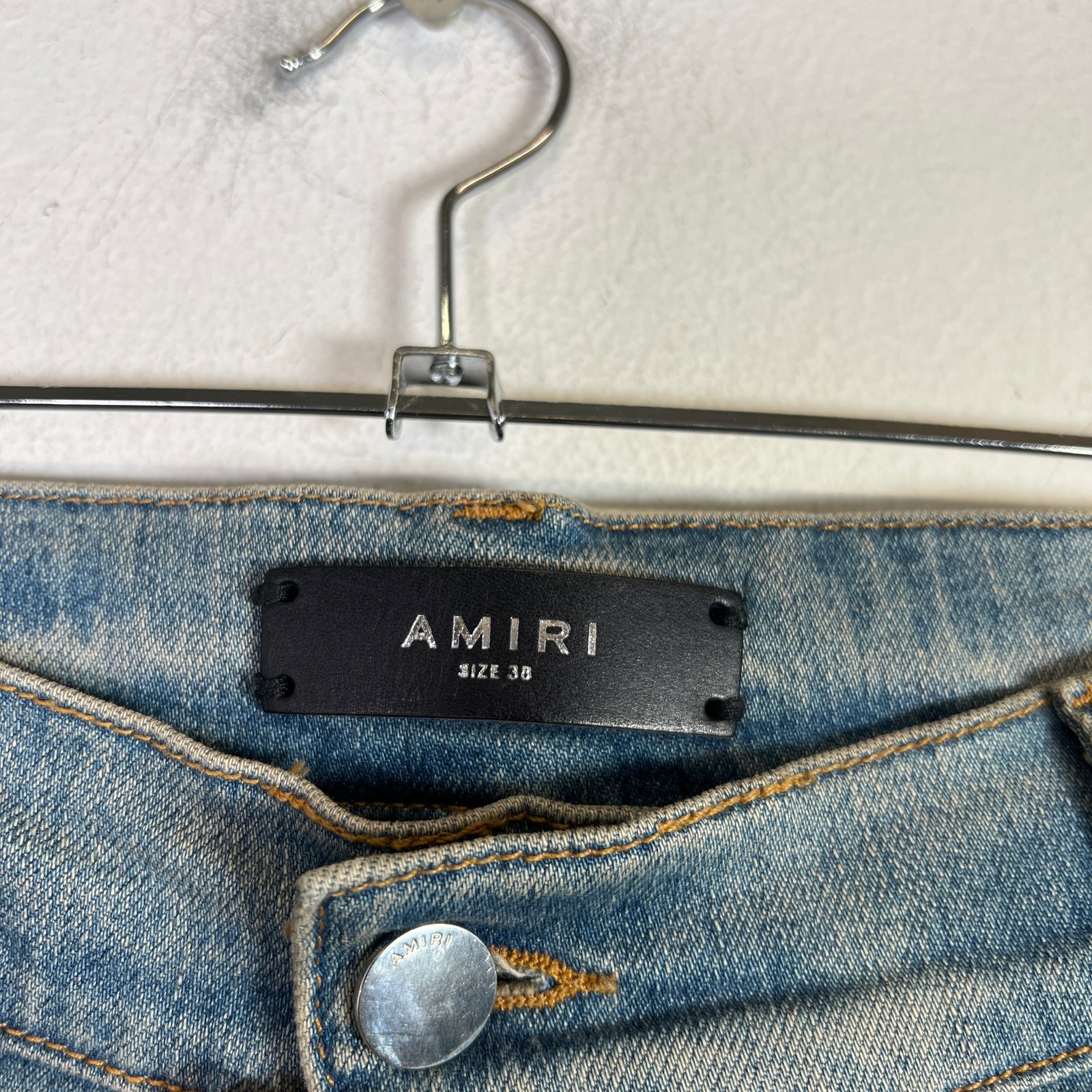 Amiri Light Indigo MX1 Black Patch Denim Jeans