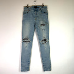 Amiri MX1 Zebra Patch Jeans