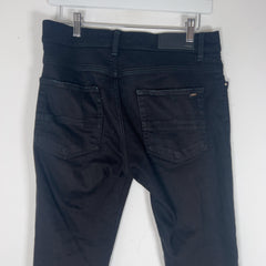 Amiri MX1 Cracked Denim Jeans