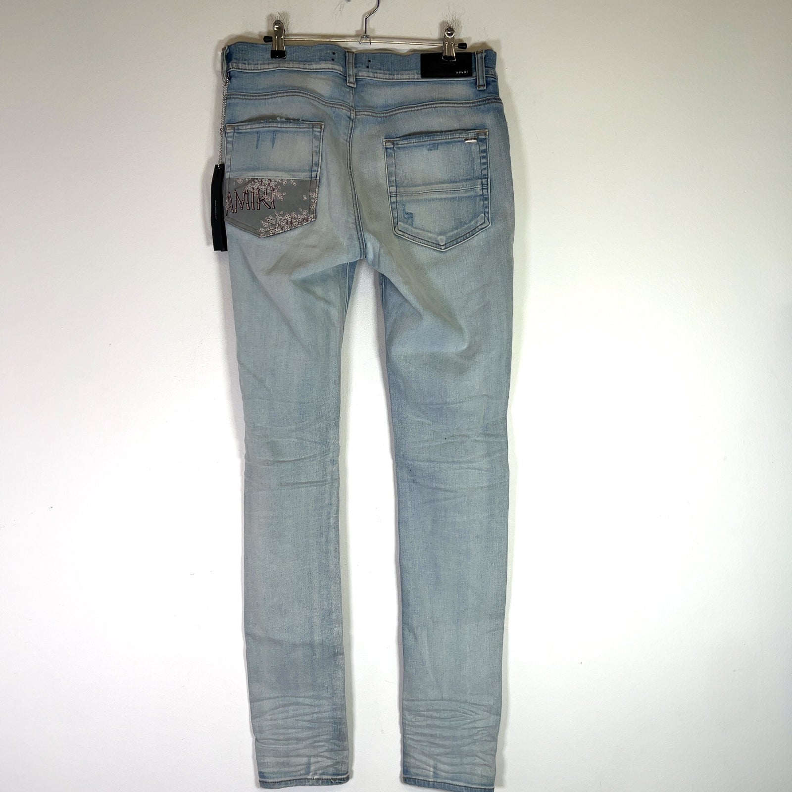 Amiri Light Indigo Hibiscus Art Patch Denim Jeans