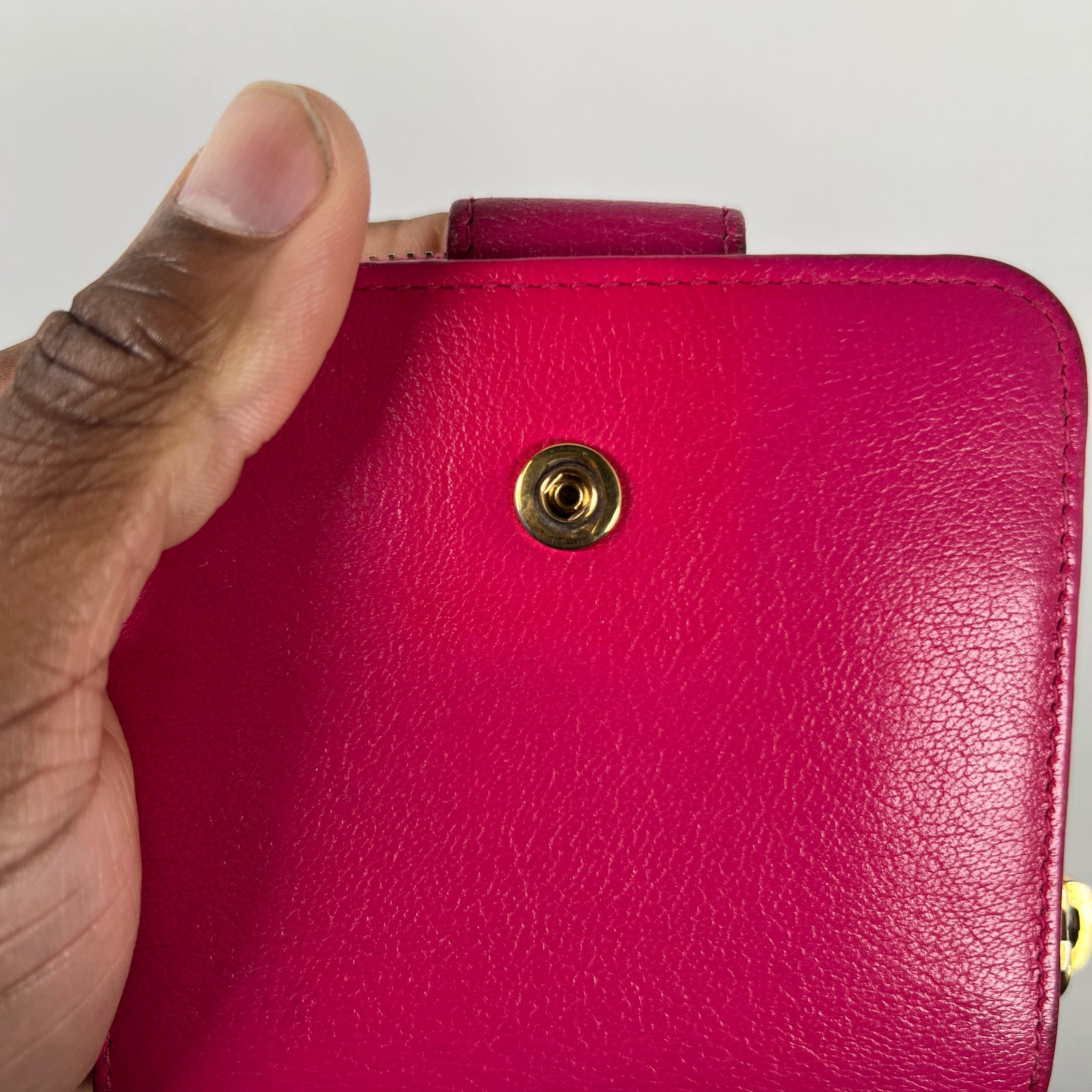 Yves Saint Laurent Pink Cassandra Embossed Round Zip Wallet