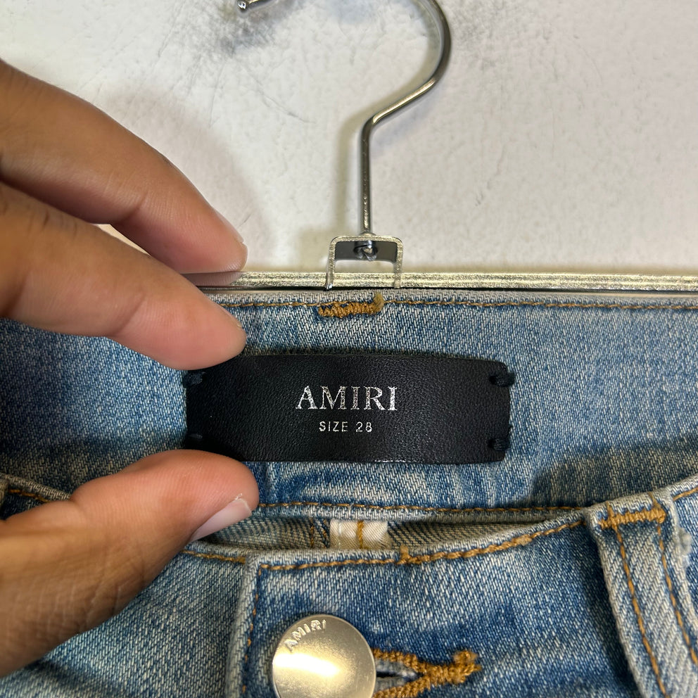 Amiri Lightwash Staggered Logo Denim Jeans
