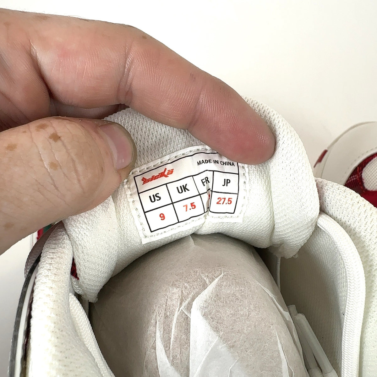 Sicko x Eric Emanuel ‘Born From Pain’ Plaid Hiking Sneakers