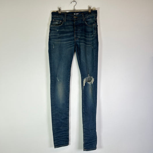 Amiri Dark Wash Indigo Distressed Jeans