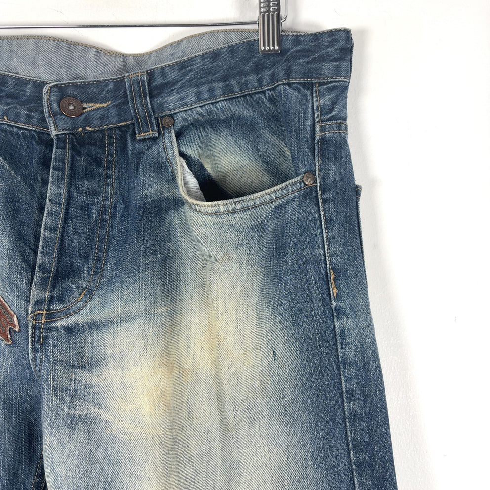 Dolce & Gabbana Faded Out Wash Patched Jeans