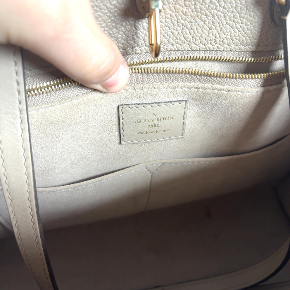 Louis Vuitton Empreinte All Over Monogram Tote Bag