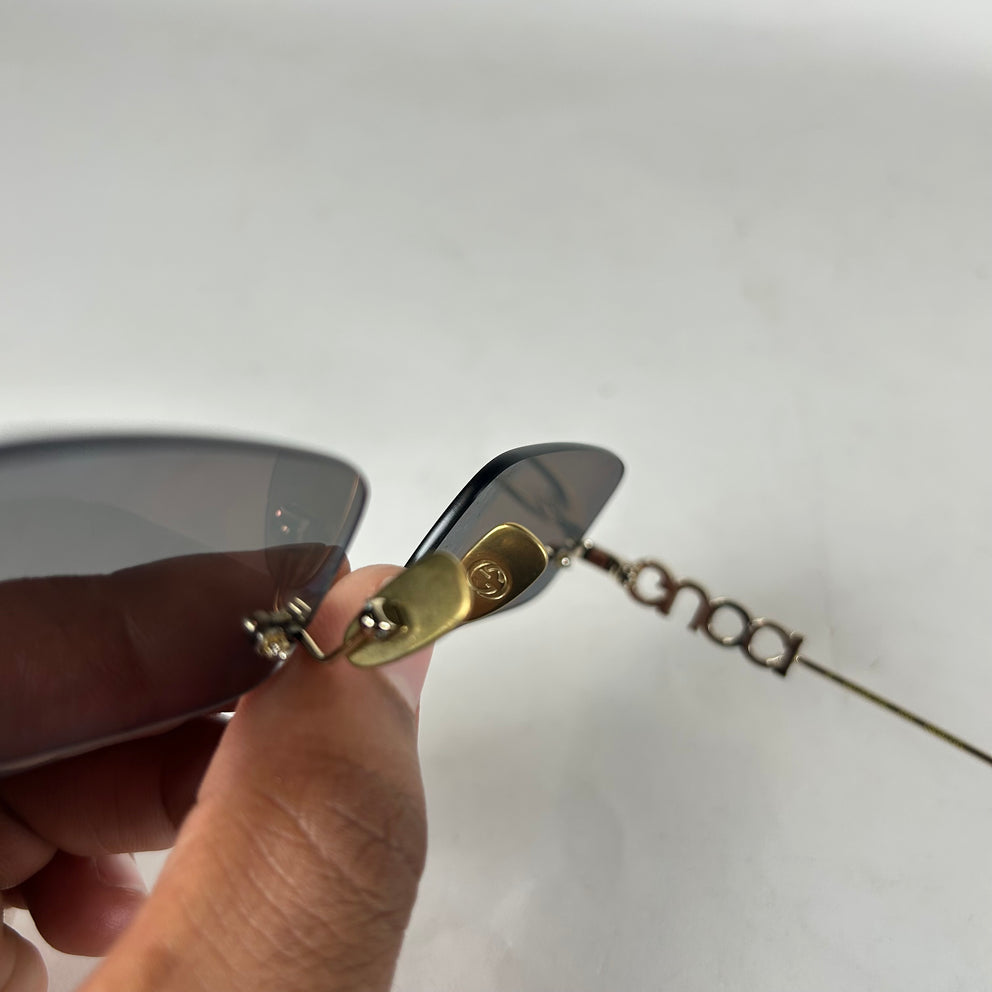 Gucci Spellout Logo Rimless Sunglasses