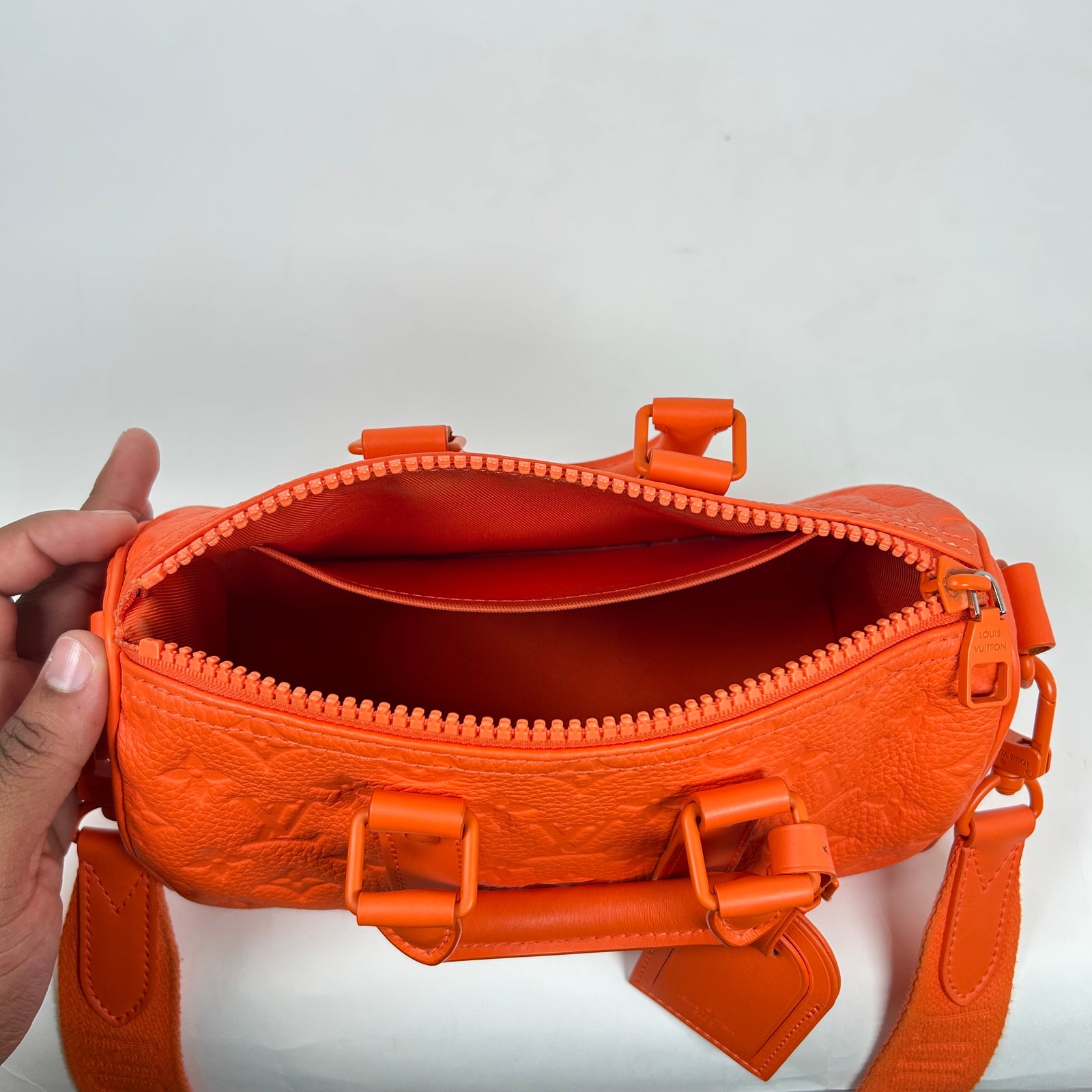 Louis Vuitton Orange Monogram Taurillon Keepall Bandouliere 25 Bag