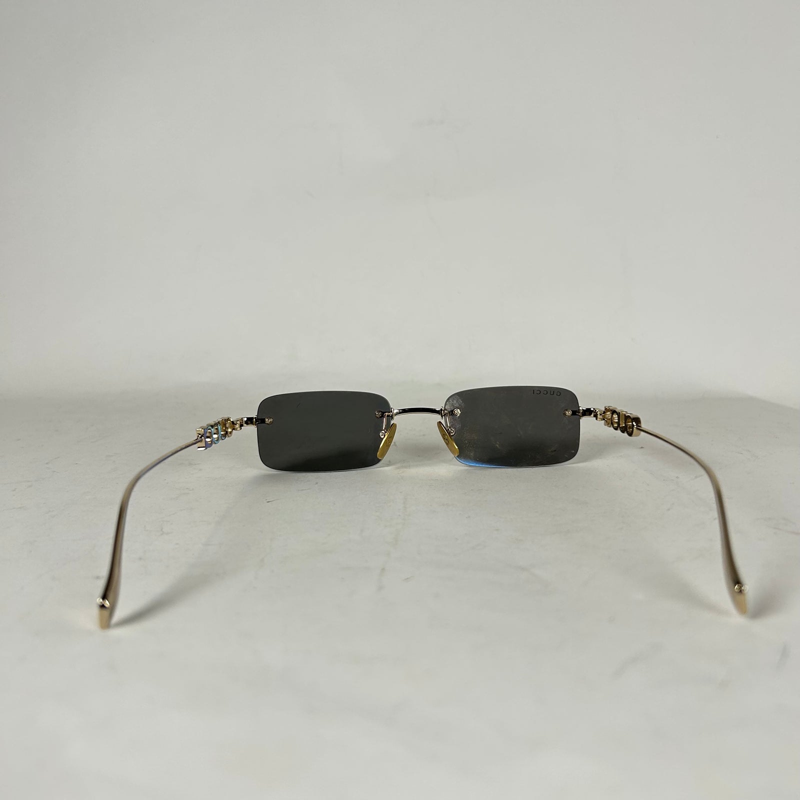 Gucci Spellout Logo Rimless Sunglasses